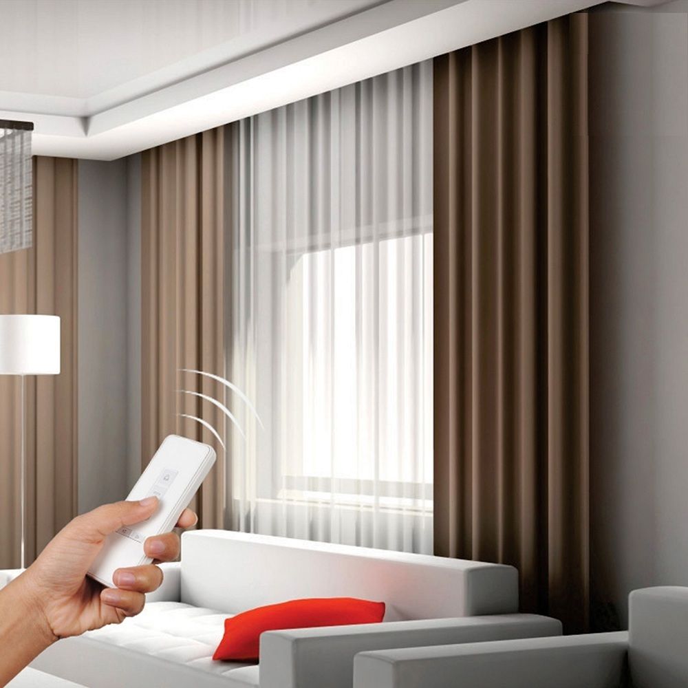 Room with motorised curtain track