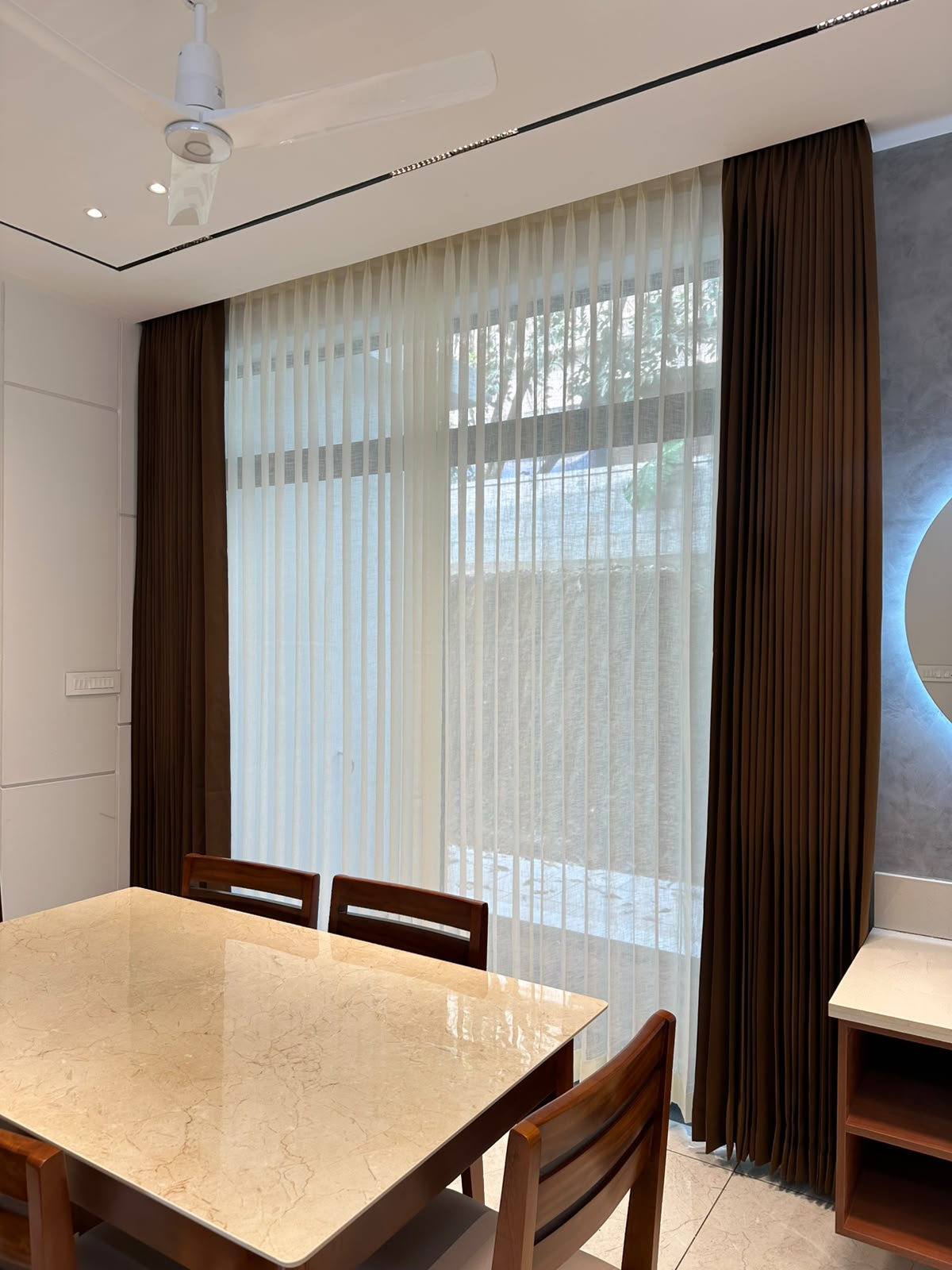 Room dressed with pleated curtains