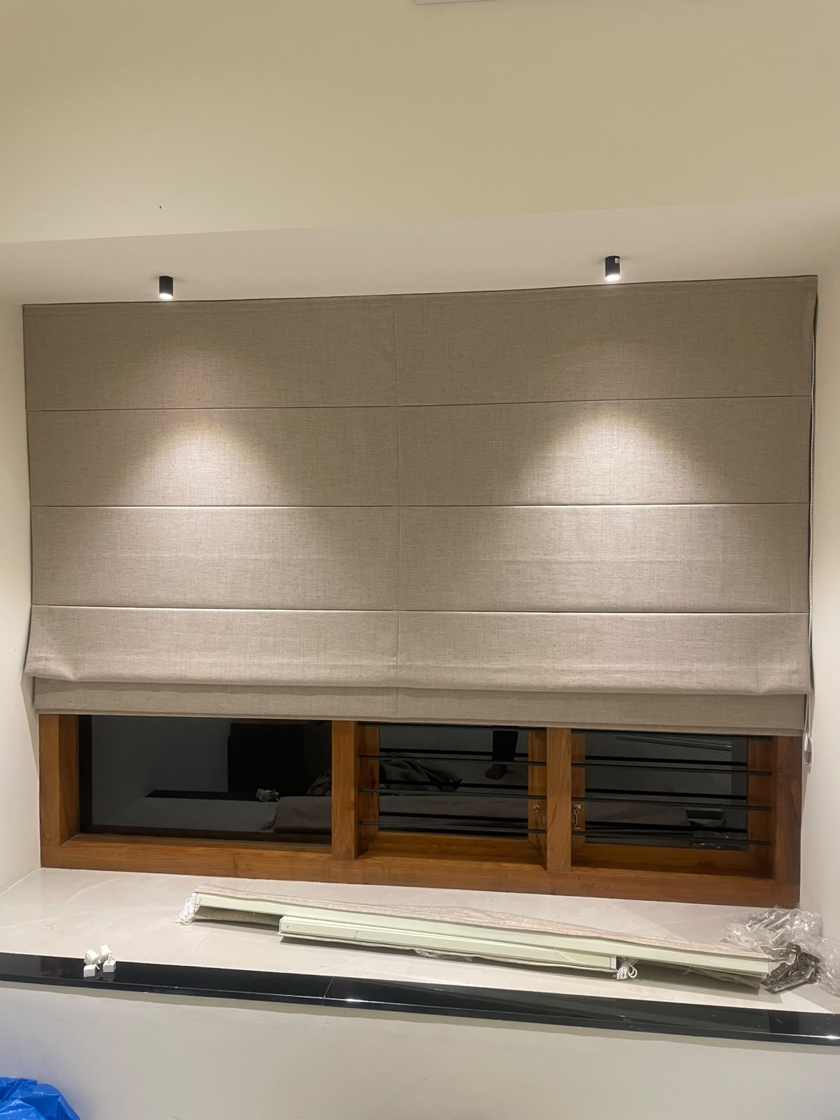Living room fitted with Roman blinds
