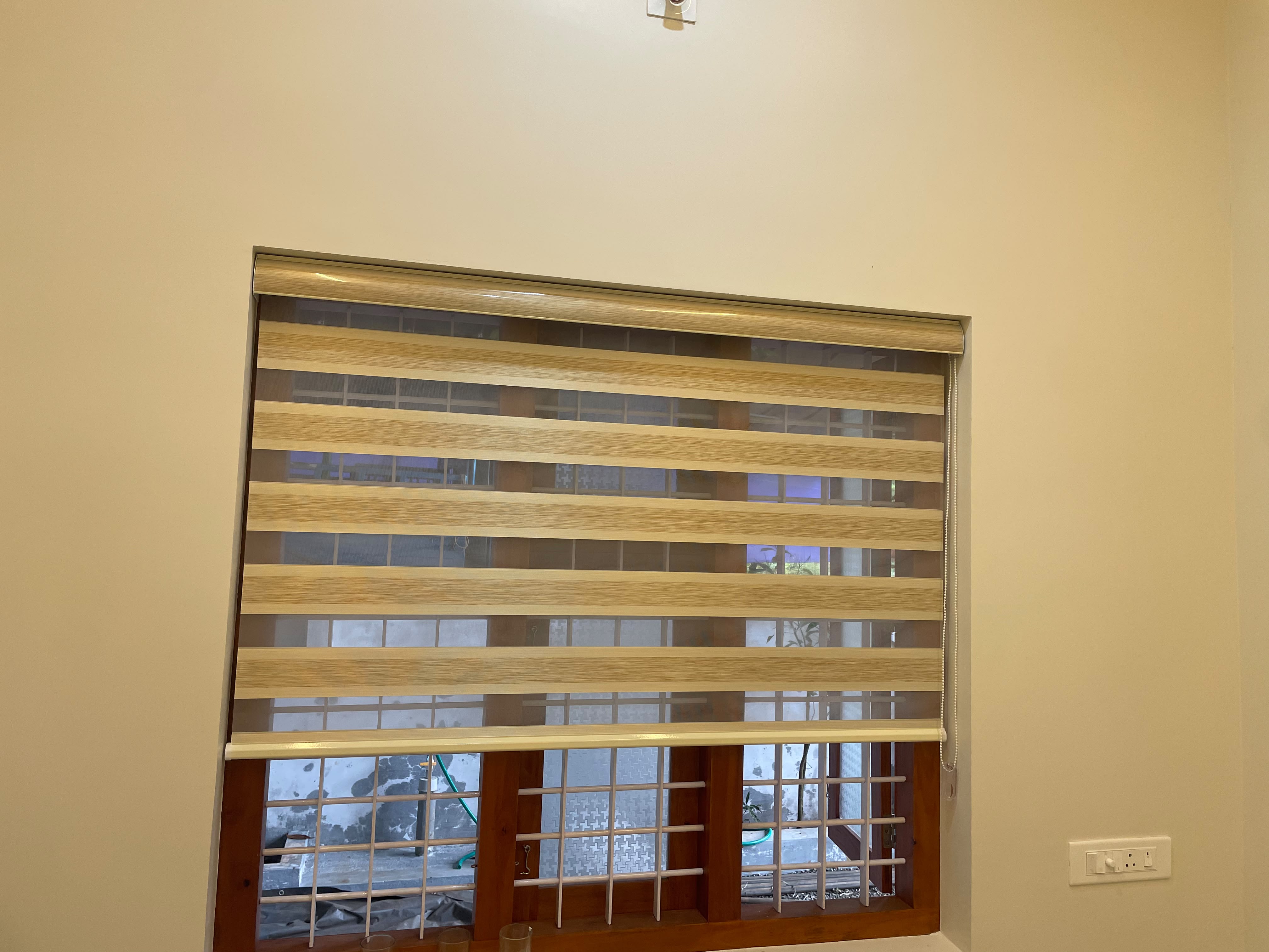 Window fitted with zebra blinds